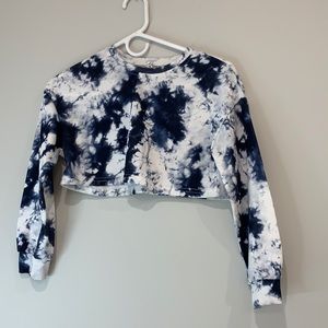it’s a blue and white tie dye cropped sweater